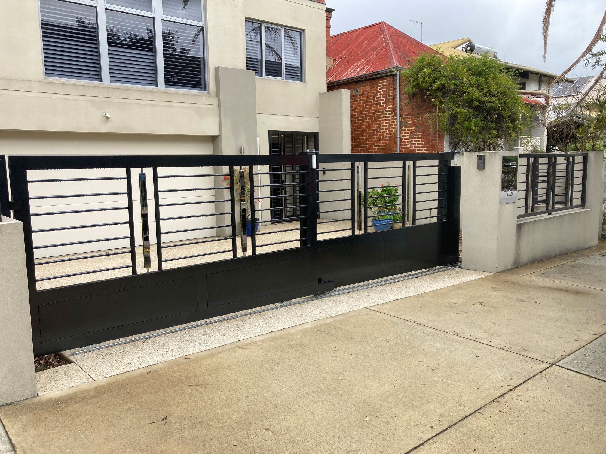 Western Automate - Custom Aluminium & Stainless Steel Electric Telescopic Vehicle Gate