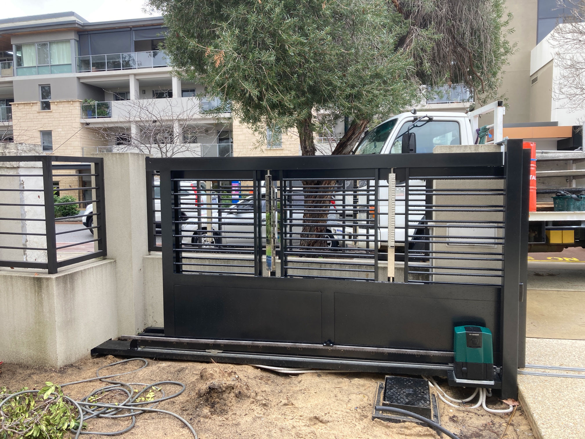 Western Automate - Custom Aluminium & Stainless Steel Electric Telescopic Vehicle Gate